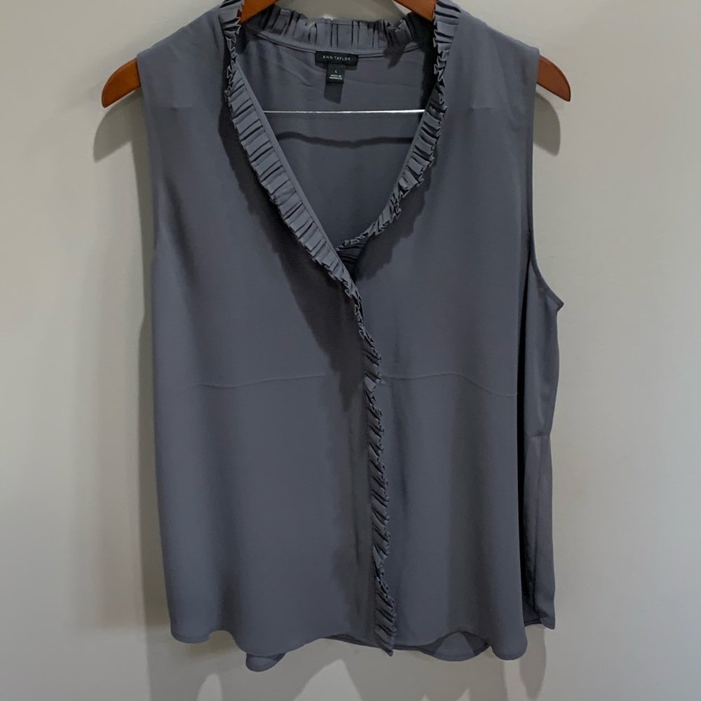 Ruffle neck sleeveless blouse